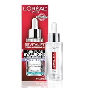 best hydrating toner Bottle of hydrating facial toner placed beside cotton pads and a glass of water.